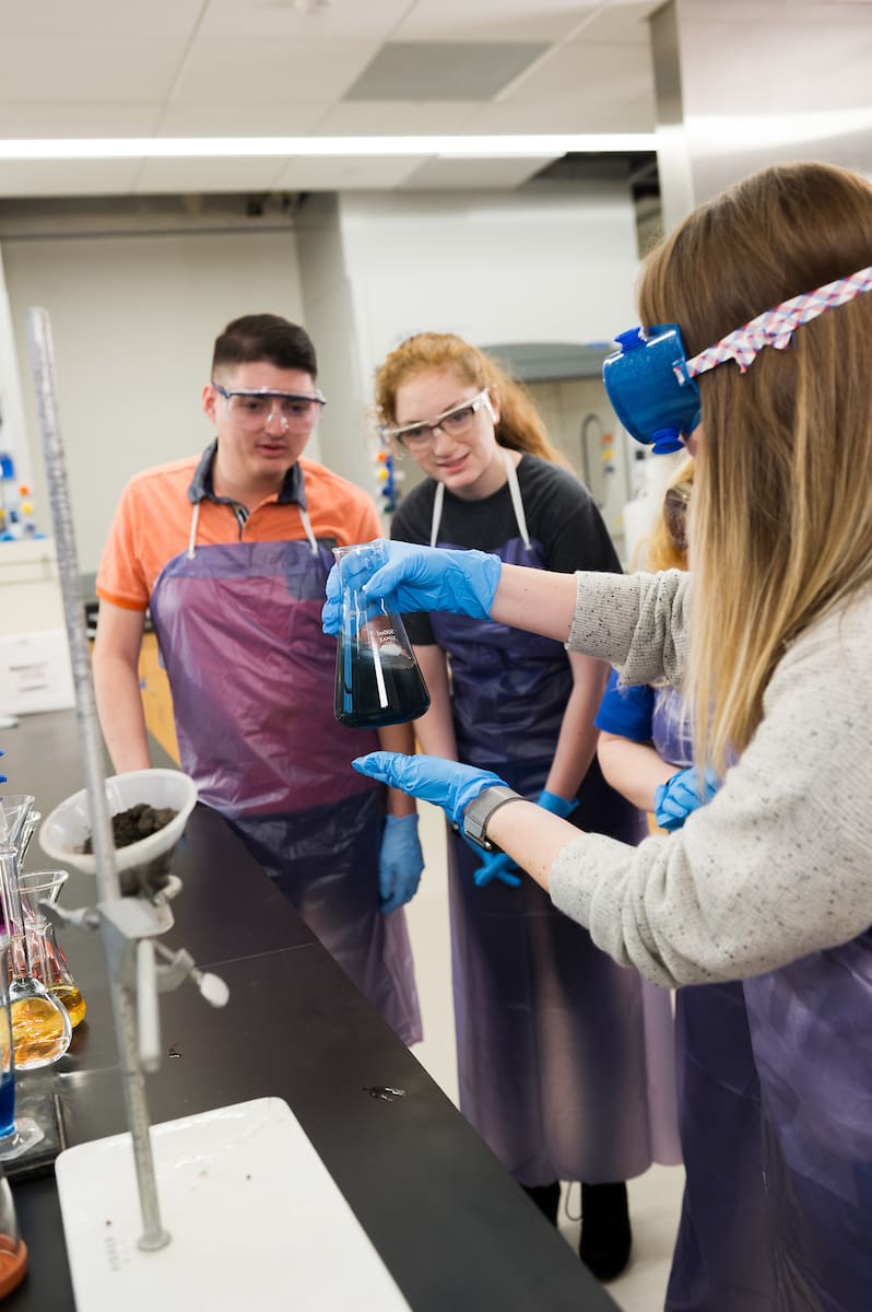 Chemistry students performing a demonstration