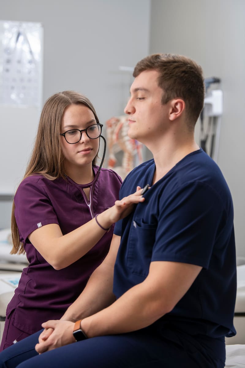 Physician Assistant Demonstration of stethoscope