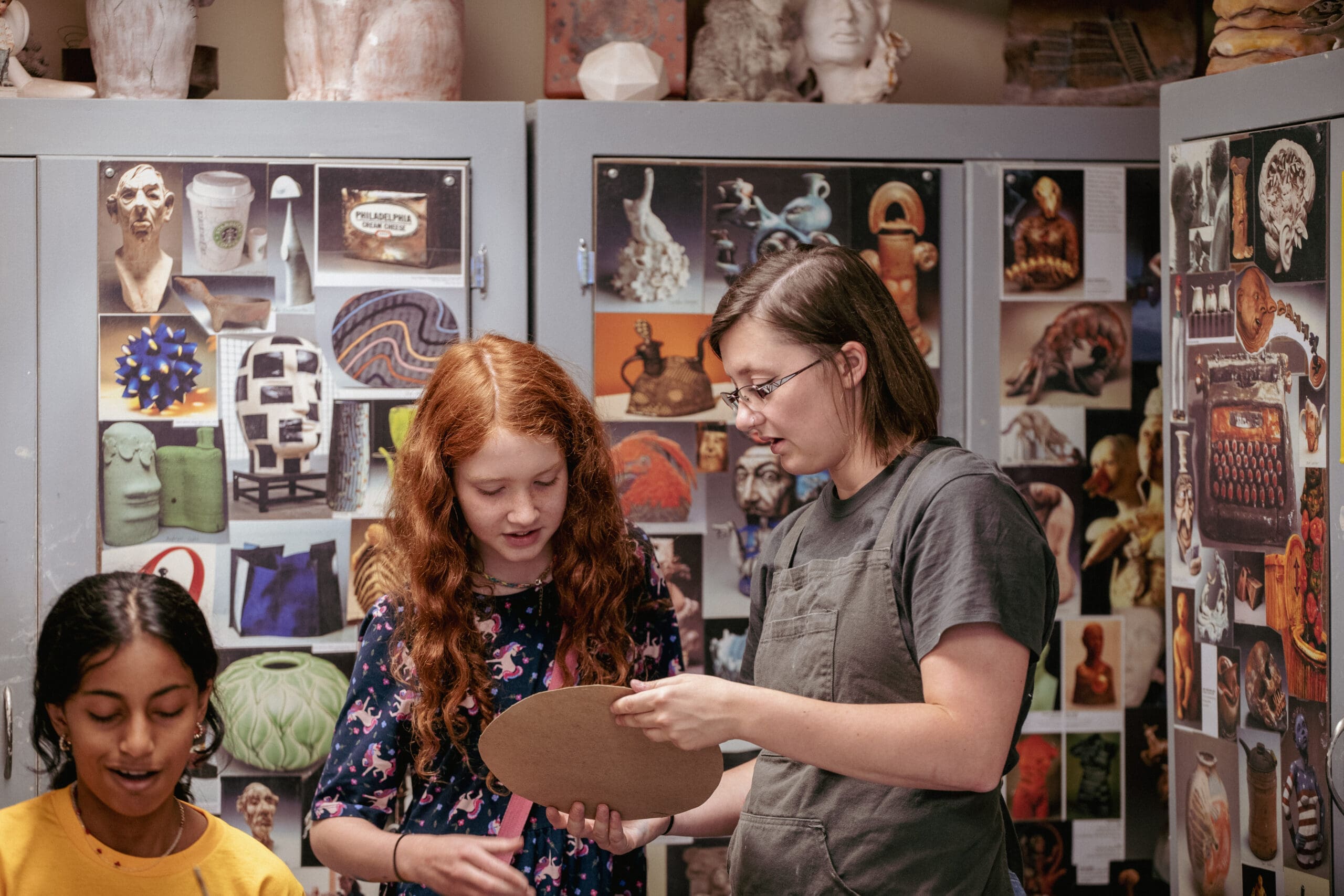 Campers looking at art at Art Camp