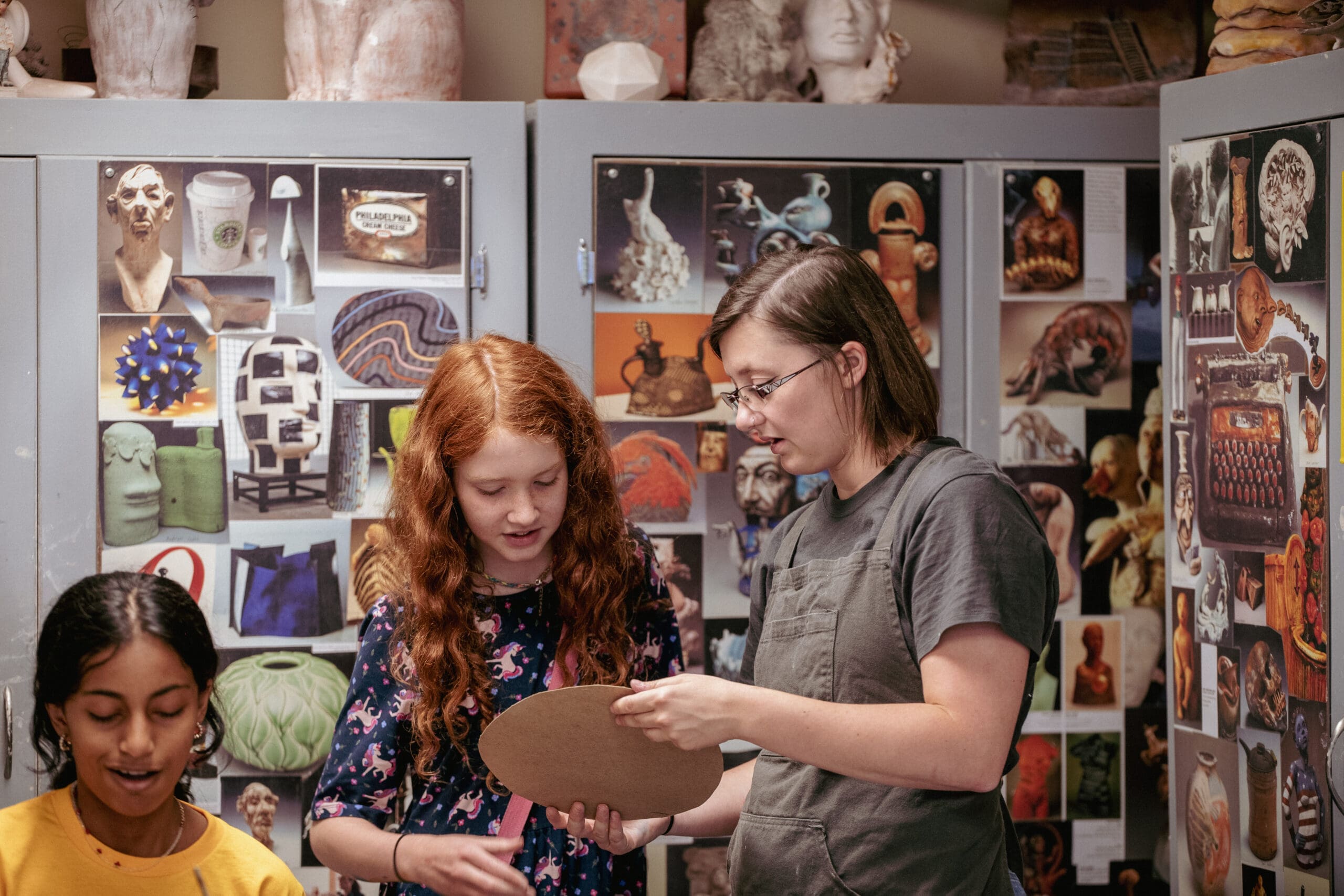 Campers looking at art at Art Camp 