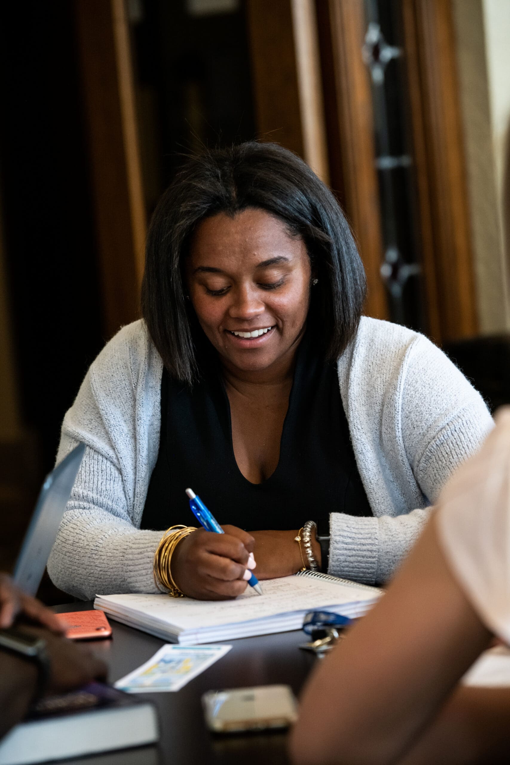 Woman writing in her notebook