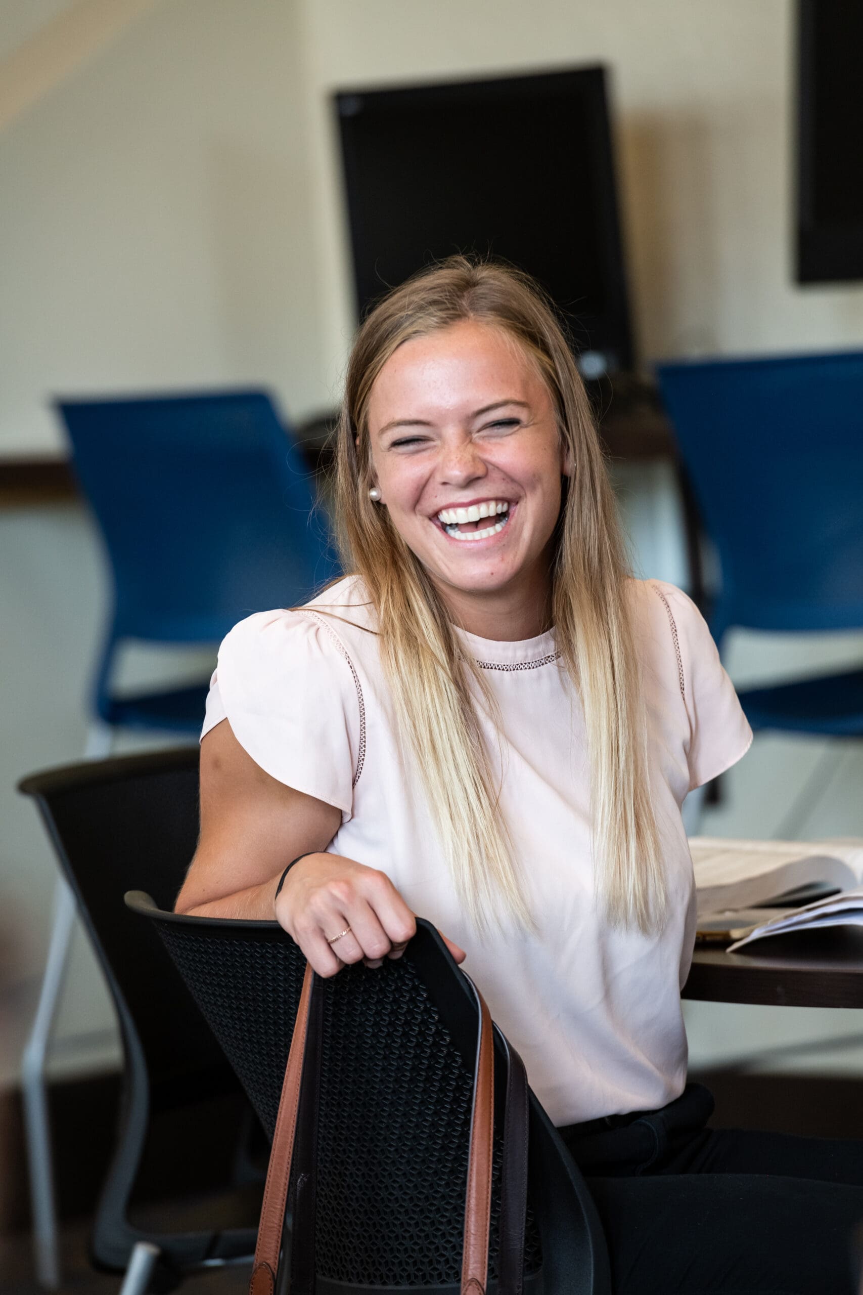 Woman laughing in class