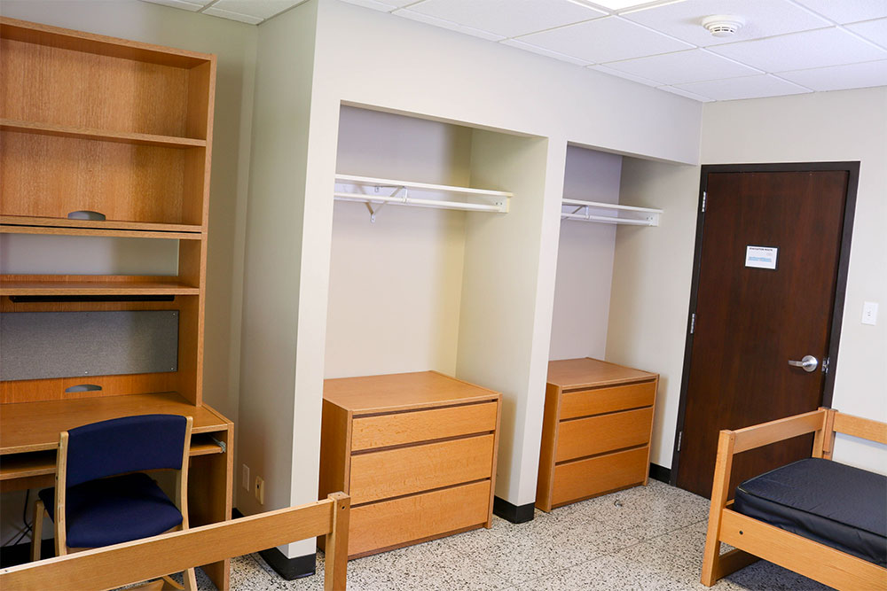 Bonzel's rooms contain 2 Twin XL beds, desks, and dressers.