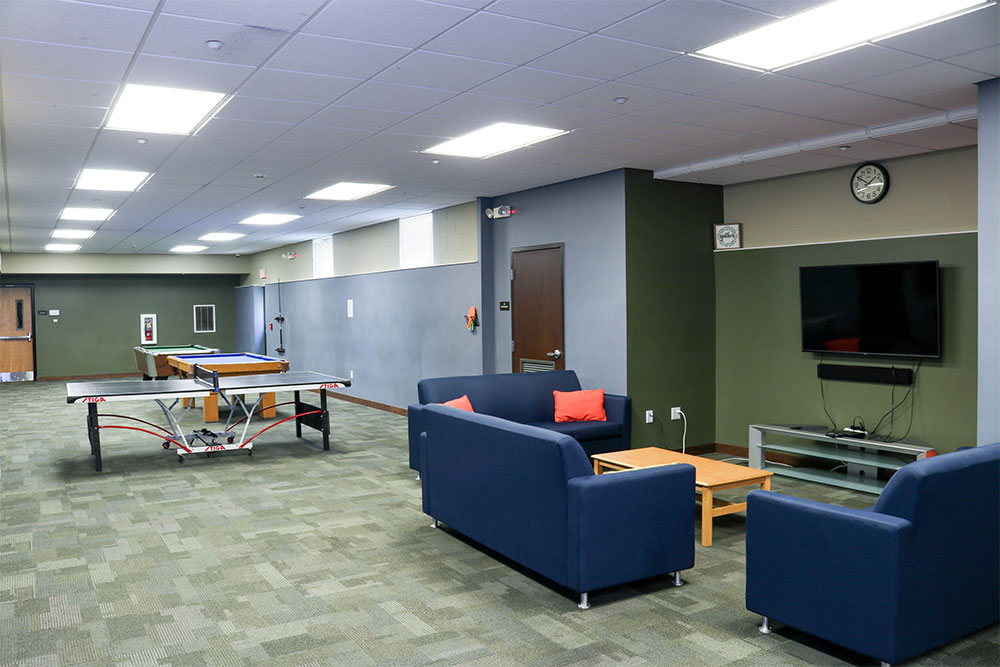 The Bonzel Hall lounge has foosball, pool table, and ping pong tables, plus a large flat-screen TV.