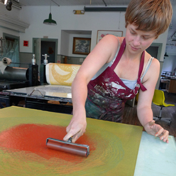 Monika Meler working in the art studio lab.