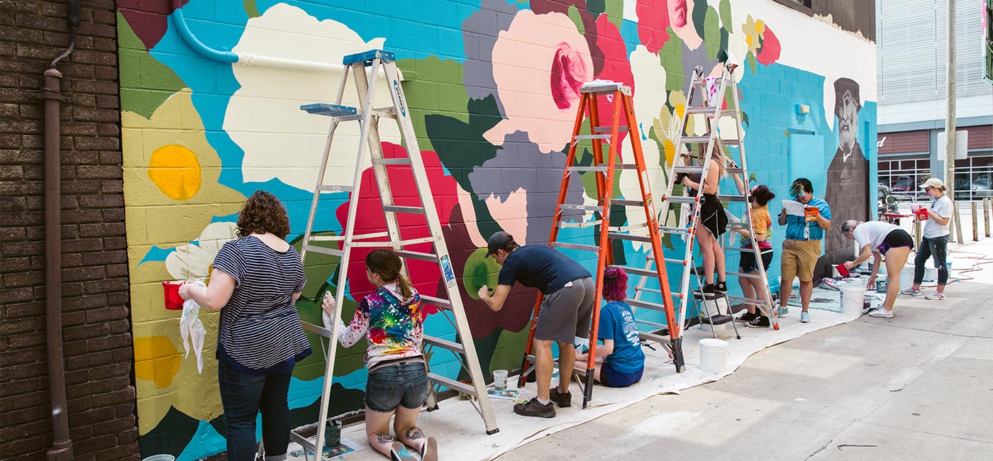 soca students working on mural