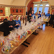 USF Alumni Association Cabinet delivers Easter baskets to SCAN